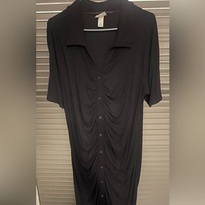 Button and rouche detail. Does not unbutton.